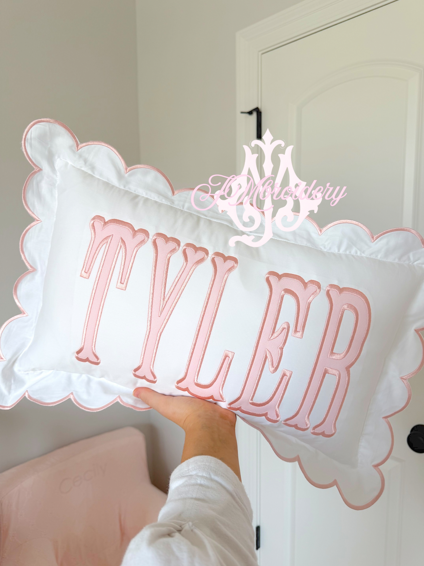 Scalloped nursery pillow