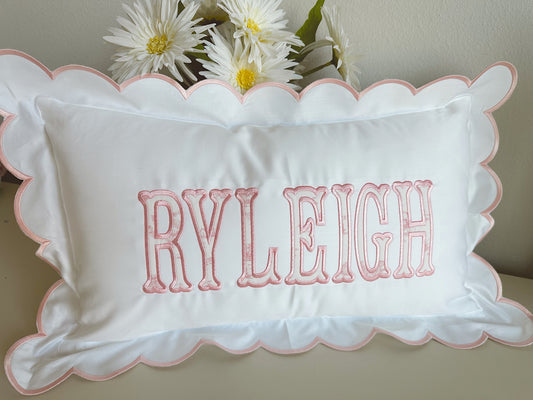 Scalloped nursery pillow