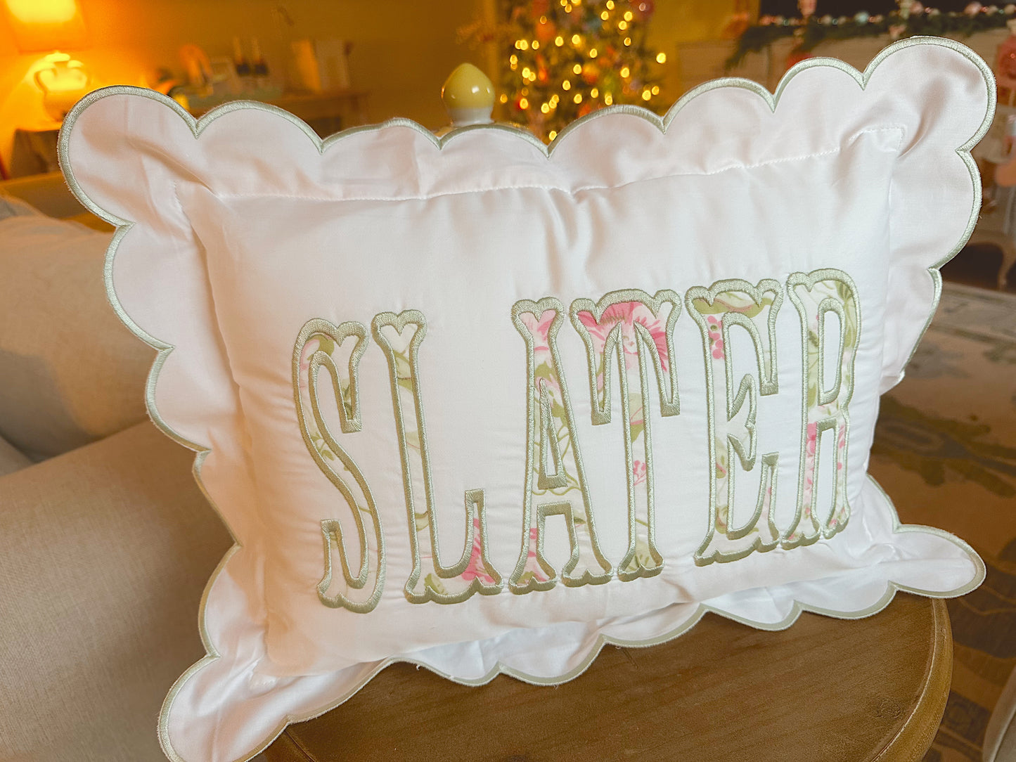 Scalloped nursery pillow