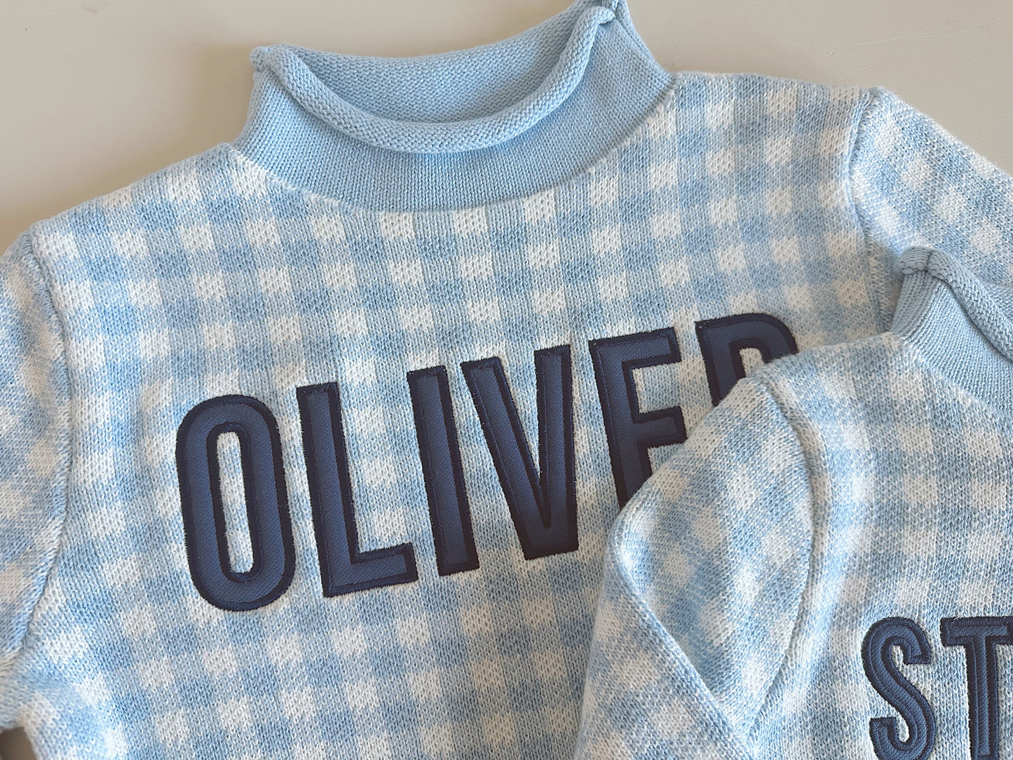 Gingham roll neck sweater