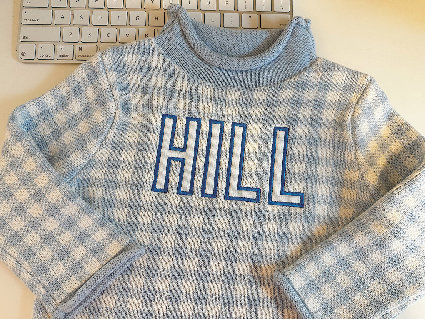 Gingham roll neck sweater