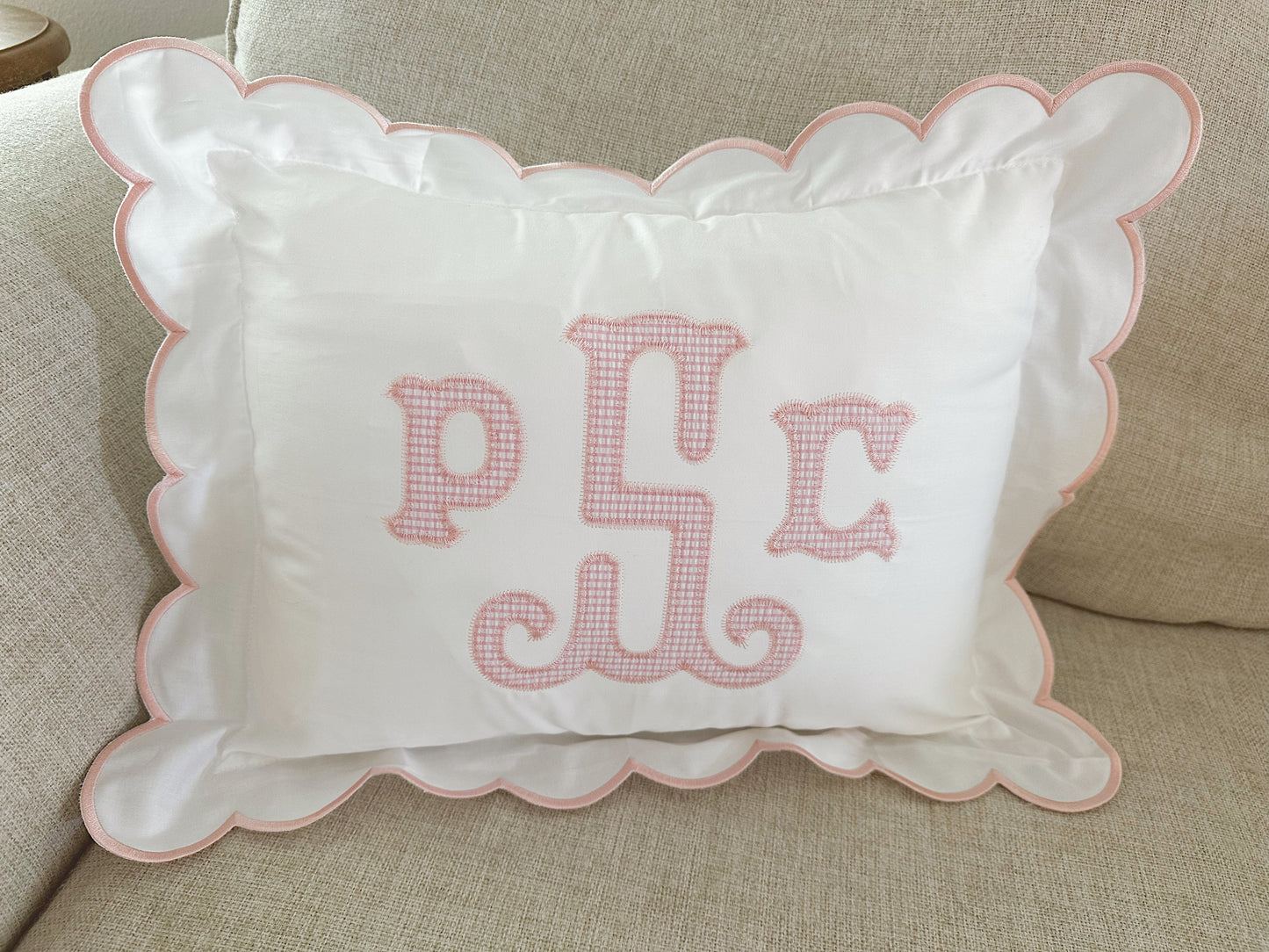 Scalloped nursery pillow