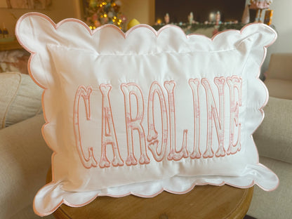 Scalloped nursery pillow