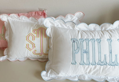 Scalloped nursery pillow