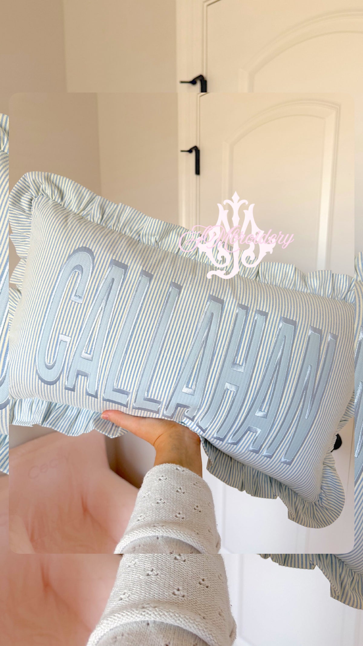 Striped ruffle pillow