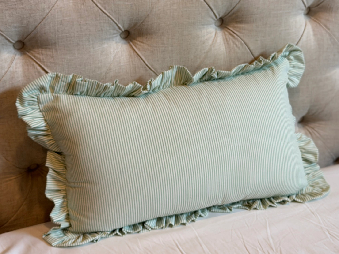 Striped ruffle pillow